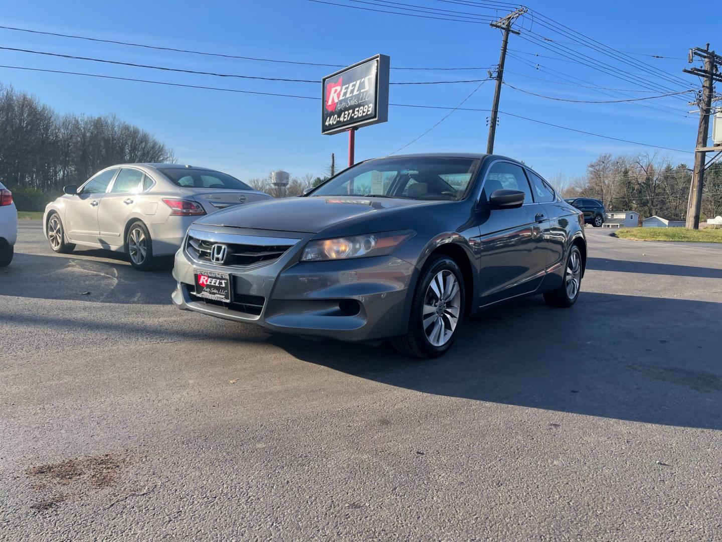 2012 Gray /Black Honda Accord EX Coupe AT (1HGCS1B74CA) with an 2.4L I4 DOHC 16V engine, 5-Speed Automatic transmission, located at 547 E. Main St., Orwell, OH, 44076, (440) 437-5893, 41.535435, -80.847855 - Photo#0